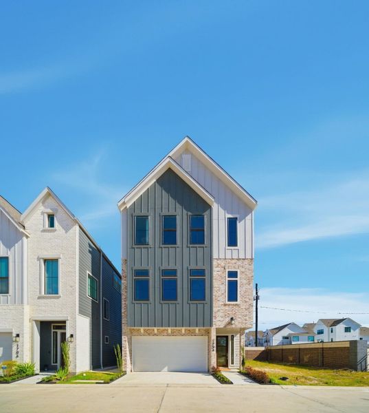 Front exterior of a new home in Spring Valley Creek, Houston, TX, highlighting curb appeal (Image 18).