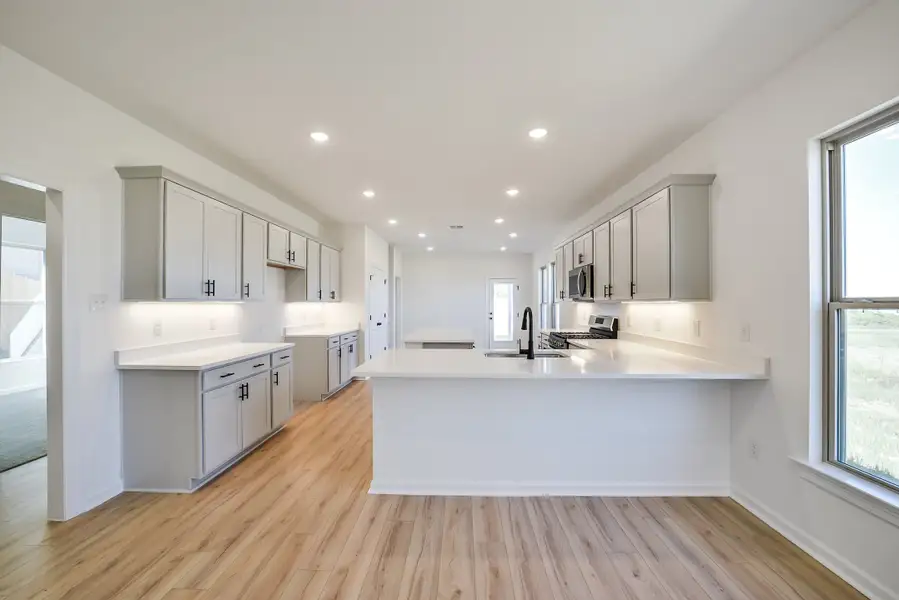 Furnished interior view inside a new home in Mostyn Springs, Magnolia (Image 7). Furnished interior view inside a new home in Mostyn Springs, Magnolia (Image 7).