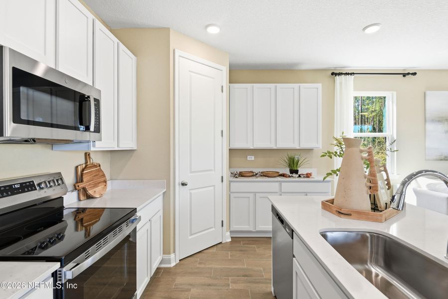 Furnished interior view inside a new home in TrailMark II, St. Augustine (Image 8).