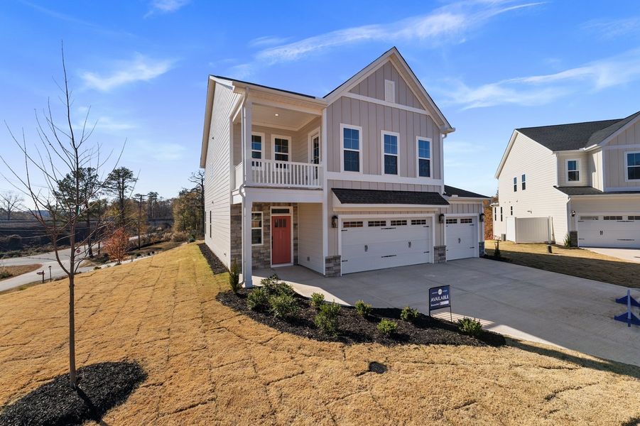 Front exterior of a new home in Lakeside Saluda, Greenville, SC, highlighting curb appeal (Image 2). Front exterior of a new home in Lakeside Saluda, Greenville, SC, highlighting curb appeal (Image 2).