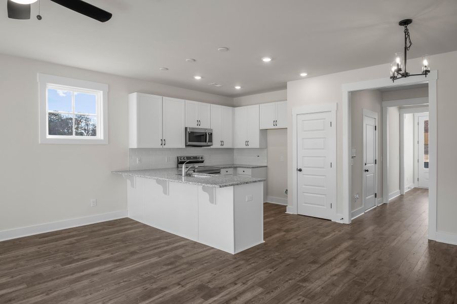 Photo is of a similar home