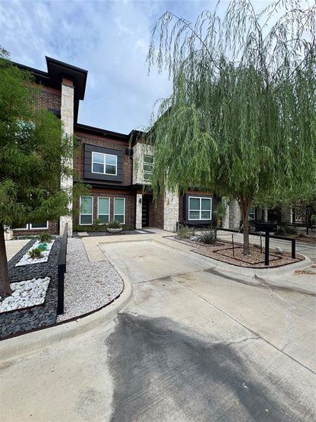 Front exterior of a new home in , Waxahachie, TX, highlighting curb appeal (Image 1). Front exterior of a new home in , Waxahachie, TX, highlighting curb appeal (Image 1).