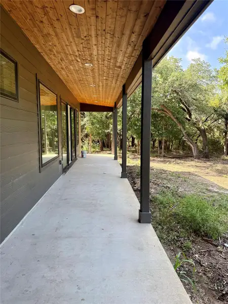 Long, covered back porch complete with a BBQ stub out. Long, covered back porch complete with a BBQ stub out.