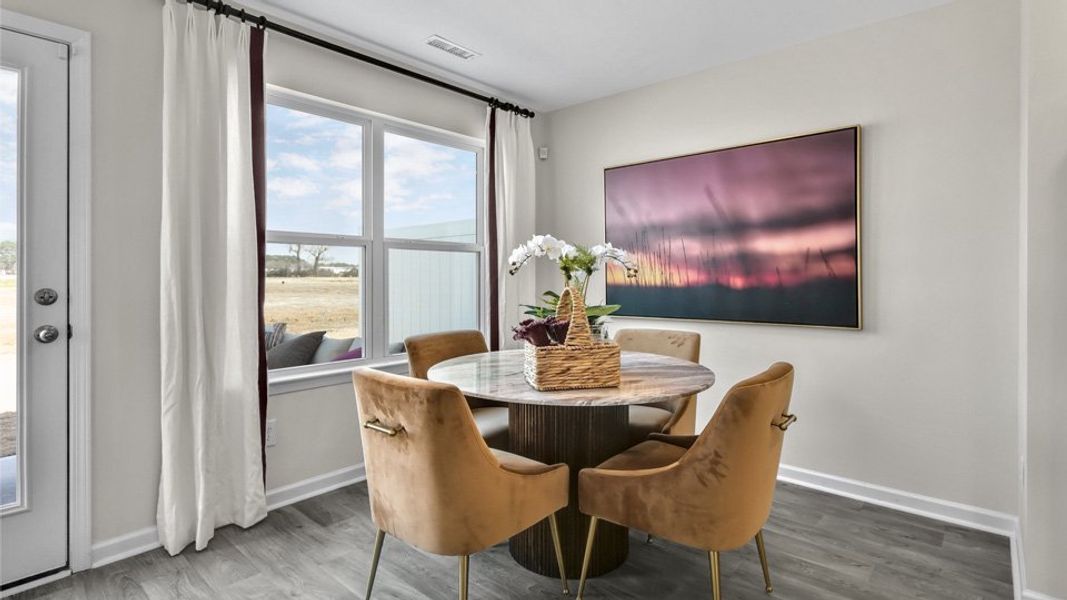 Furnished interior view inside a new home in North Village Townes, Greensboro (Image 10).