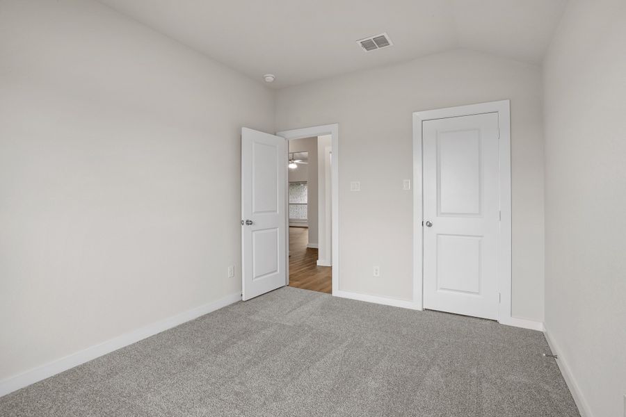 Representative unfurnished interior of a home built from the Waterford III by Cheldan Homes in Stoneview, Glen Rose (Image 45).