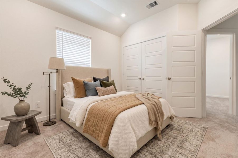This bedroom features a bright window with blinds, soft carpet, high ceilings, and a double-door closet for added storage. The neutral color palette and clean finishes create a fresh, welcoming space that can easily fit a variety of furniture layouts and personal styles. This photo has been virtually staged for visual reference. This bedroom features a bright window with blinds, soft carpet, high ceilings, and a double-door closet for added storage. The neutral color palette and clean finishes create a fresh, welcoming space that can easily fit a variety of furniture layouts and personal styles. This photo has been virtually staged for visual reference.