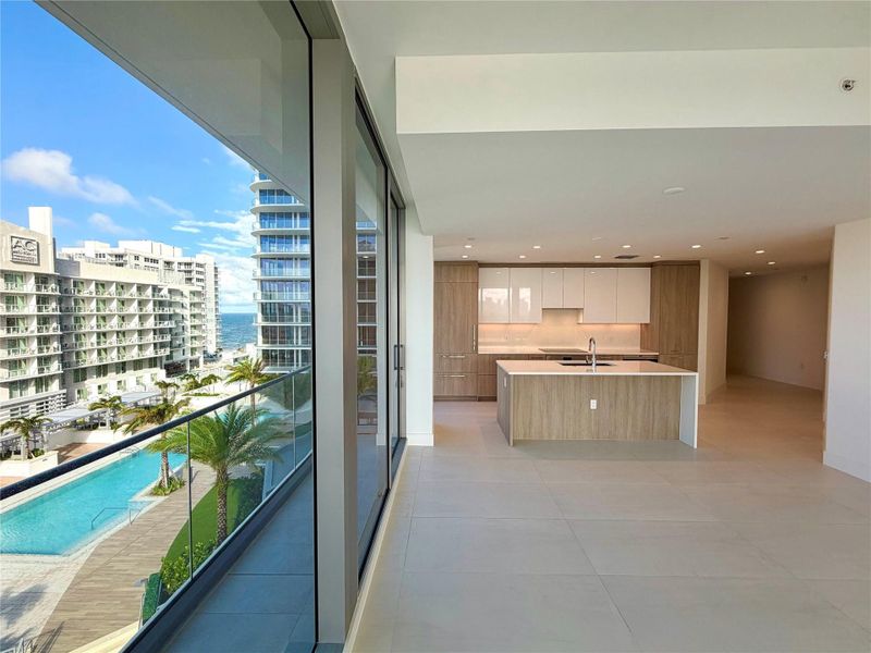 Pool view and kitchen