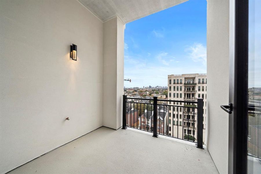 Covered balcony with Medical Center views. Enjoy this as your extension to the outdoors.