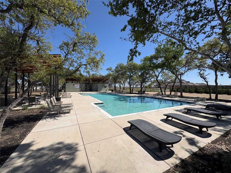 Community pool featuring a patio area