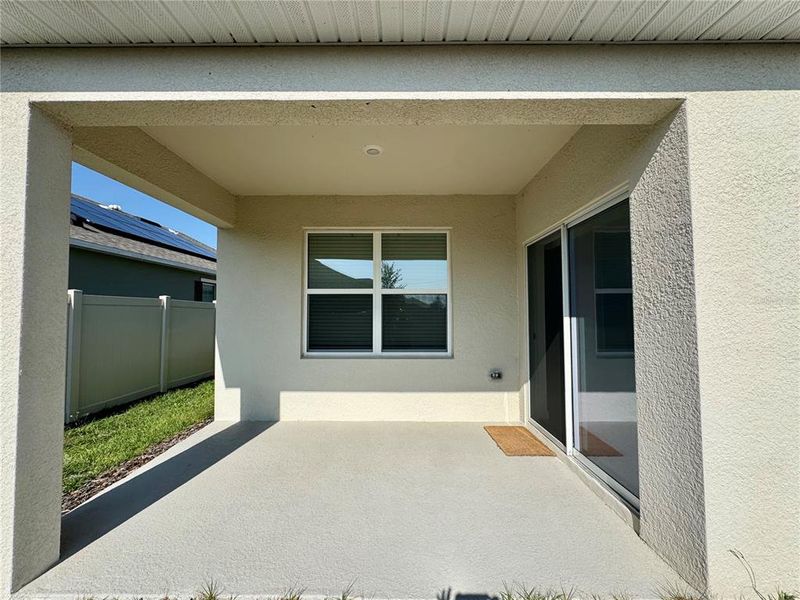 Exterior details and patio area of a home in Eden Hills, Lake Alfred (Image 3).