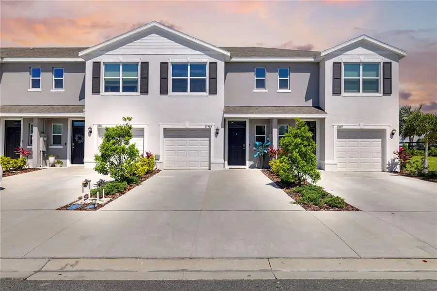 Front exterior of a new home in , Bradenton, FL, highlighting curb appeal (Image 27).