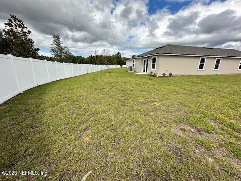 Exterior details and patio area of a home in Rookery, Green Cove Springs (Image 3).