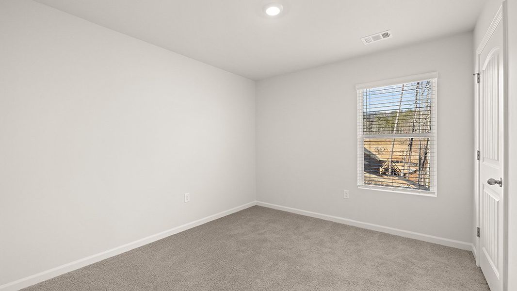 Spacious, unfurnished interior of a new home in Greyton Springs Place, Buford (Image 37).