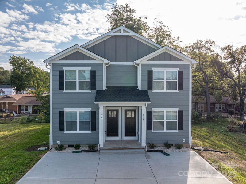Front exterior of a new home in , Hickory, NC, highlighting curb appeal (Image 1).