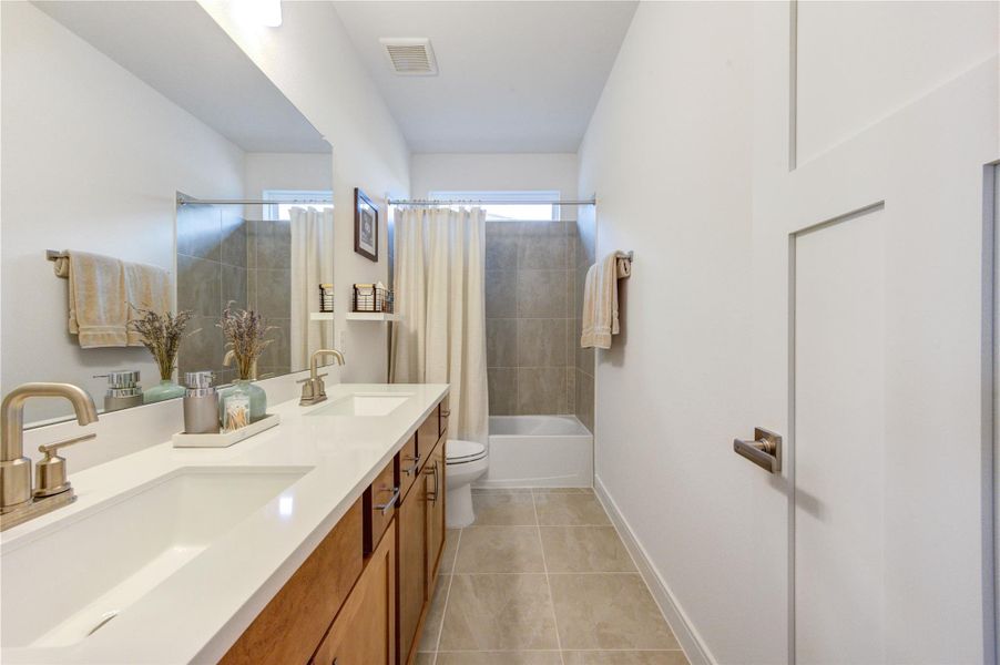 Furnished interior view inside a new home in Easthaven at Bridgeland Central, Cypress (Image 42).