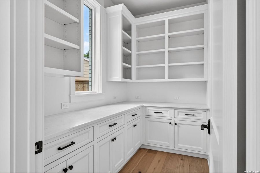 Furnished interior view inside a new home in , Alamo Heights (Image 35).