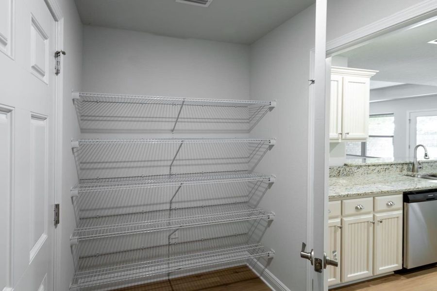 Representative unfurnished interior of a home built from the 2005 by Adams Homes in Parkland Place, Pace (Image 15).