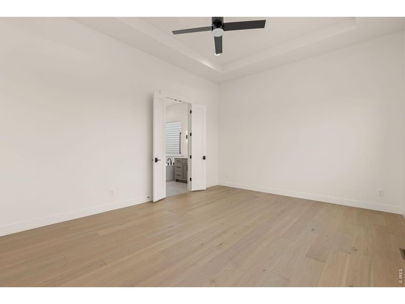 Spacious, unfurnished interior of a new home in RainDance, Windsor (Image 44).