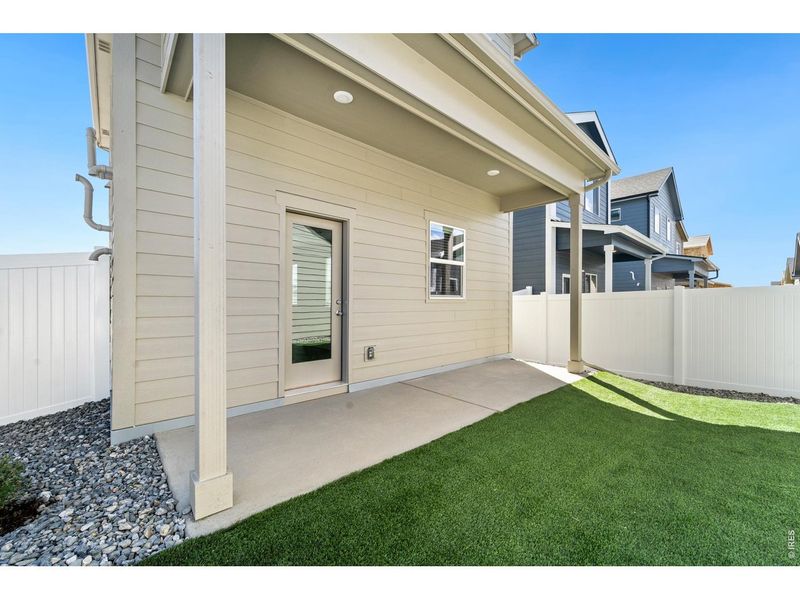 Exterior details and patio area of a home in Liberty Draw, Evans (Image 18).