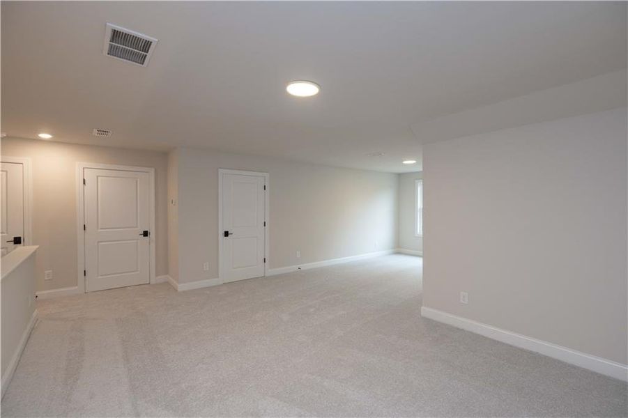 Spacious, unfurnished interior of a new home in Ward's Crossing Townhomes, Johns Creek (Image 46).