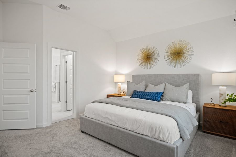 Primary Suite in the Oak home plan by Trophy Signature Homes – REPRESENTATIVE PHOTO