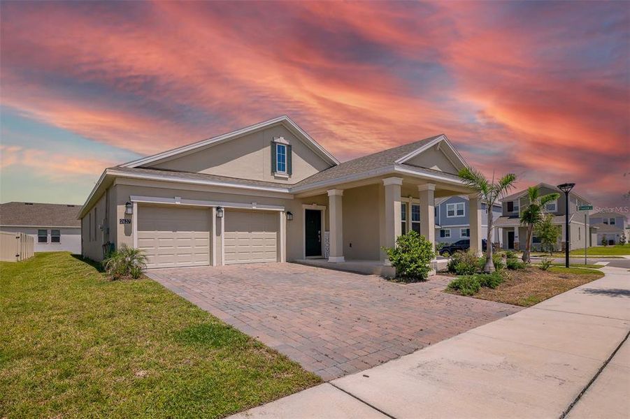 Front exterior of a new home in Tohoqua, Kissimmee, FL, highlighting curb appeal (Image 25). Front exterior of a new home in Tohoqua, Kissimmee, FL, highlighting curb appeal (Image 25).