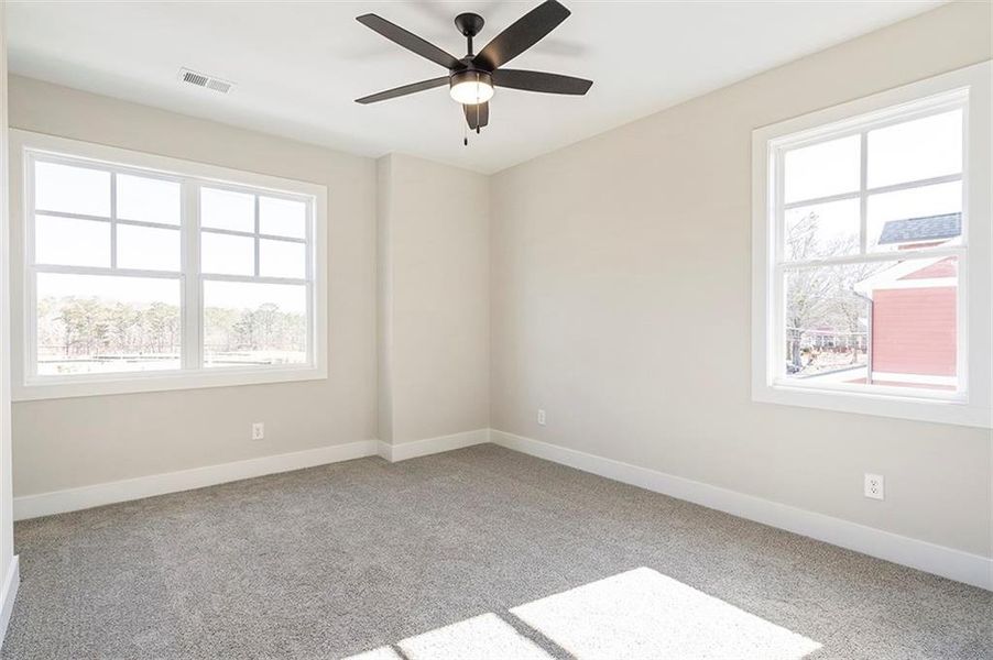 Spacious, unfurnished interior of a new home in Holly Springs Town Center, Holly Springs (Image 29).