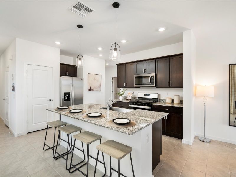 Kitchen in Ezra Floorplan at Bella Vista Trails