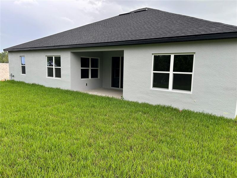 Exterior details and patio area of a home in , Brooksville (Image 14).
