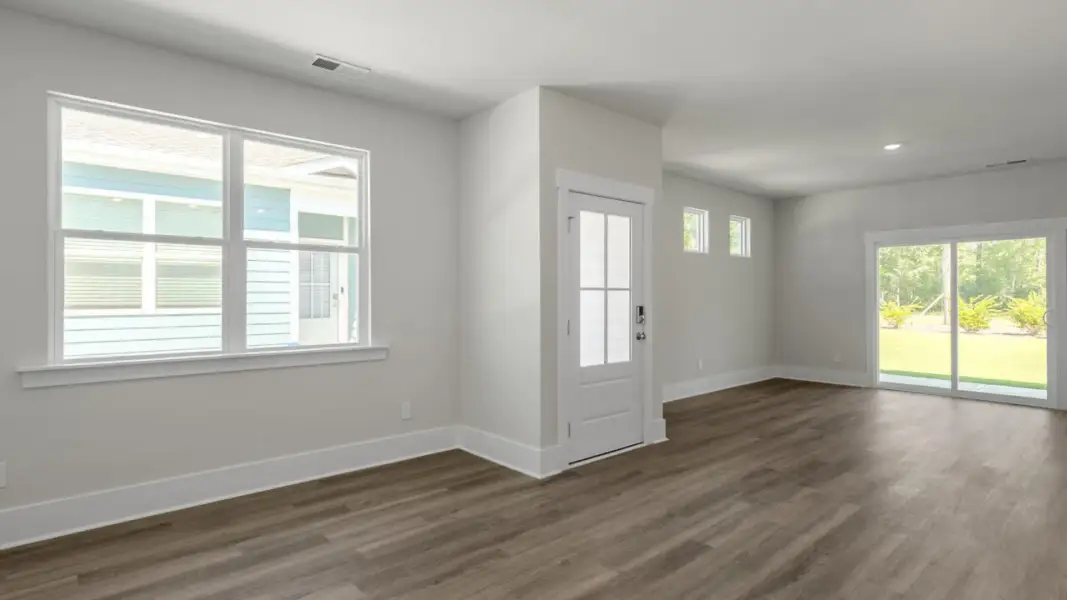 Spacious, unfurnished interior of a new home in The Retreat at Indigo Preserve Townhomes, Leland (Image 13).