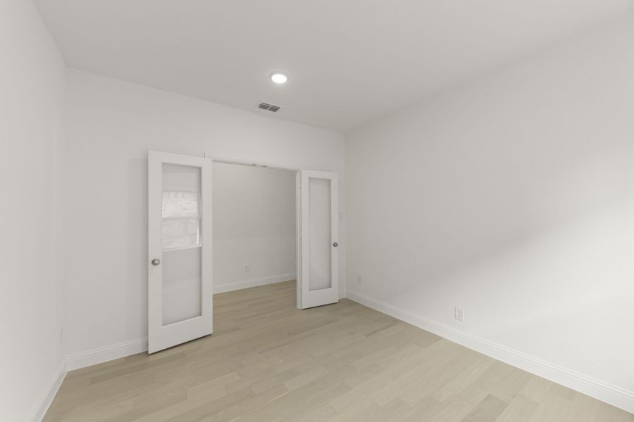 Spacious, unfurnished interior of a new home in The Reserve at Spiritas Ranch, Little Elm (Image 24).