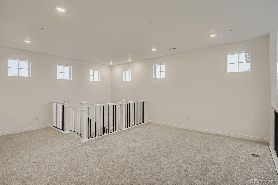 Spacious, unfurnished interior of a new home in Sunset Village: The Grand Collection, Erie (Image 12). Spacious, unfurnished interior of a new home in Sunset Village: The Grand Collection, Erie (Image 12).