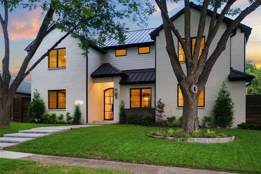 Front exterior of a new home in , Dallas, TX, highlighting curb appeal (Image 25).