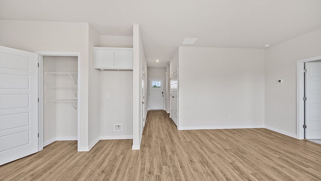Representative unfurnished interior of a home built from the Edgewood Express - Duplex by D.R. Horton in Remington Chase, Perry (Image 17).