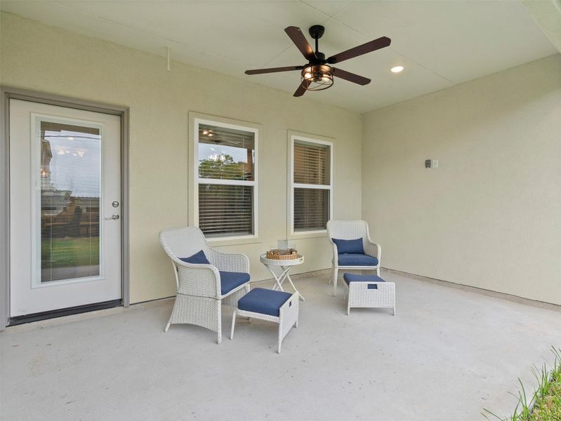 View of patio / terrace featuring a ceiling fan View of patio / terrace featuring a ceiling fan