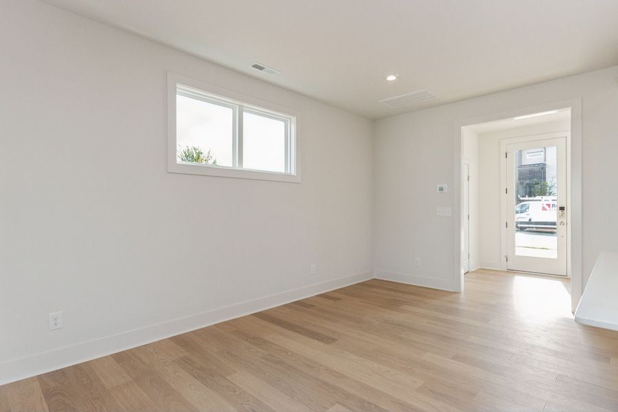 Representative unfurnished interior of a home built from the Flint A by Homes by Dickerson in Chatham Park, Pittsboro (Image 13).