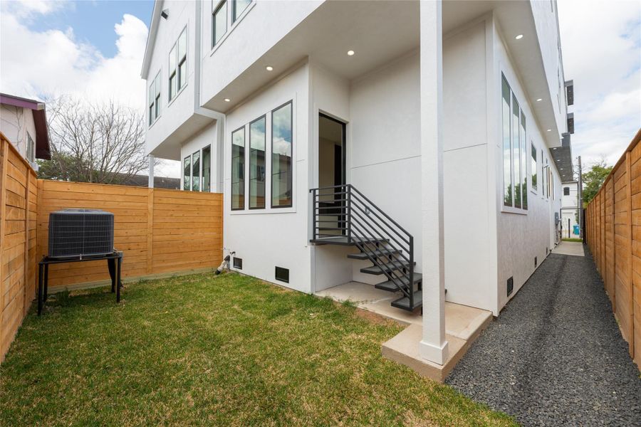 Exterior details and patio area of a home in , Houston (Image 3).