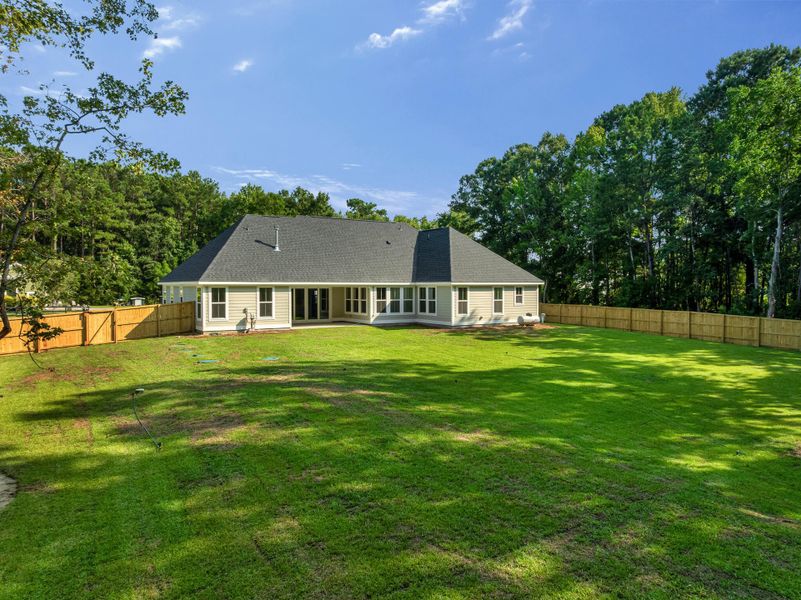 Exterior details and patio area of a home in Charleston County Homes, Awendaw (Image 3).
