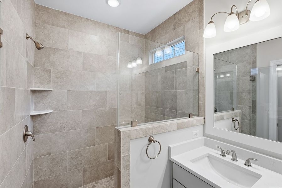 Representative furnished interior of a home built from the Kauai by Bill Clark Homes in The Sanctuary at Sunset Beach, Sunset Beach (Image 17).