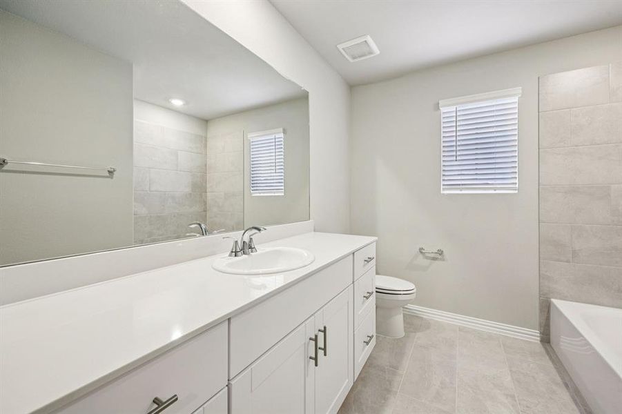 Furnished interior view inside a new home in Parks at Foster Crossing - Spring Series, Anna (Image 11).