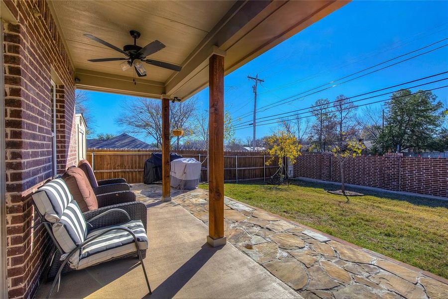 View of patio with ceiling fan