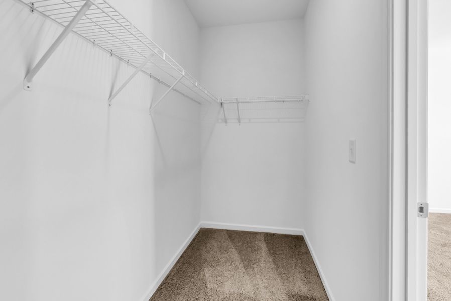Large walk in closet in owner's bedroom