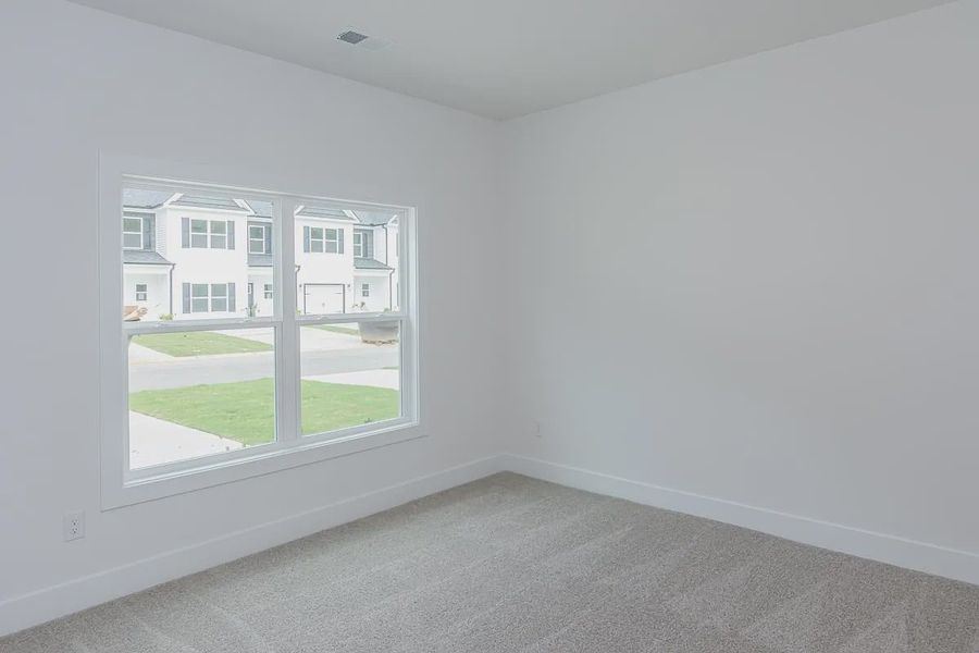 Representative unfurnished interior of a home built from the 1808 Townhome by Adams Homes in Parkstone Place Townhomes, Roebuck (Image 14). Representative unfurnished interior of a home built from the 1808 Townhome by Adams Homes in Parkstone Place Townhomes, Roebuck (Image 14).