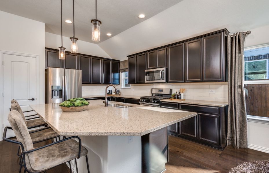 Abundant counter and cabinet space in this kitchen