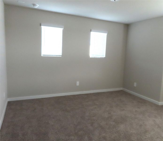 Spacious, unfurnished interior of a new home in Sierra Vista, Iowa Colony (Image 12).