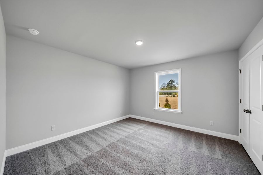 Spacious, unfurnished interior of a new home in Monroe Preserve, Chapin (Image 35).