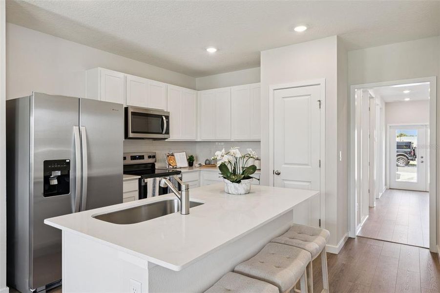 Furnished interior view inside a new home in Fish Lake Cove, Kissimmee (Image 11). Furnished interior view inside a new home in Fish Lake Cove, Kissimmee (Image 11).