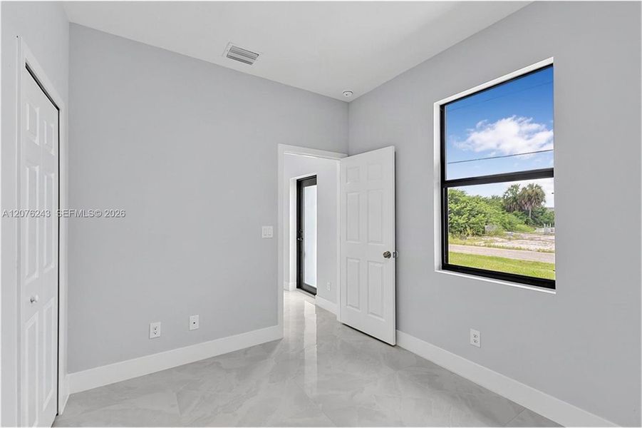 Spacious, unfurnished interior of a new home in , Lehigh Acres (Image 32).
