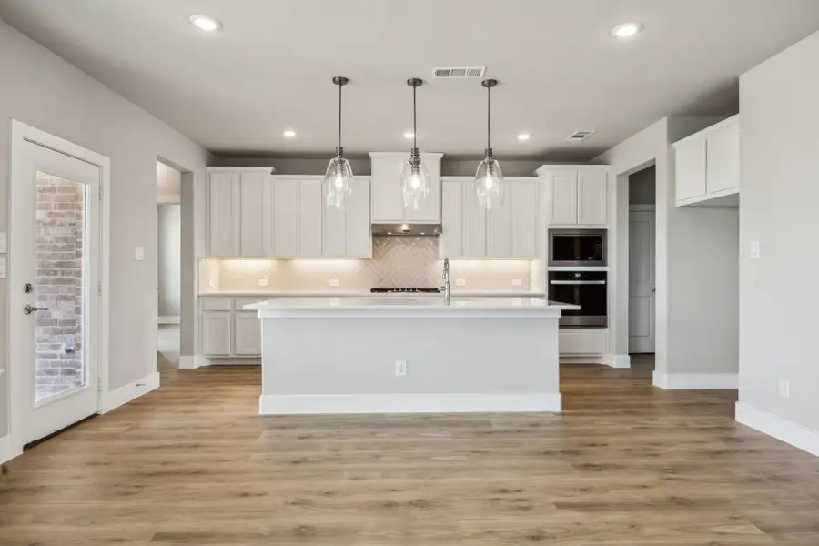 Furnished interior view inside a new home in Ellis Ranch Estates, Waxahachie (Image 6).