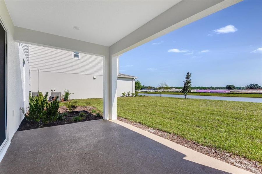 Exterior details and patio area of a home in Ardisia Park, New Smyrna Beach (Image 3).